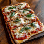 Recipe for pita bread pizza on wooden table