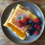 French Crepes with berries and honey